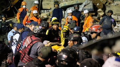 Residents were forced to flee their homes as the quake spurred emergency crews into action. (AP Photo) Residents were forced to flee their homes as the quake spurred emergency crews into action. (AP Photo)