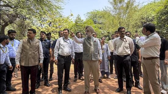 Delhi lieutenant governor Taranjit Singh Sandhu inspects the ongoing restoration and rejuvenation work at Sanjay Lake. (PTI)