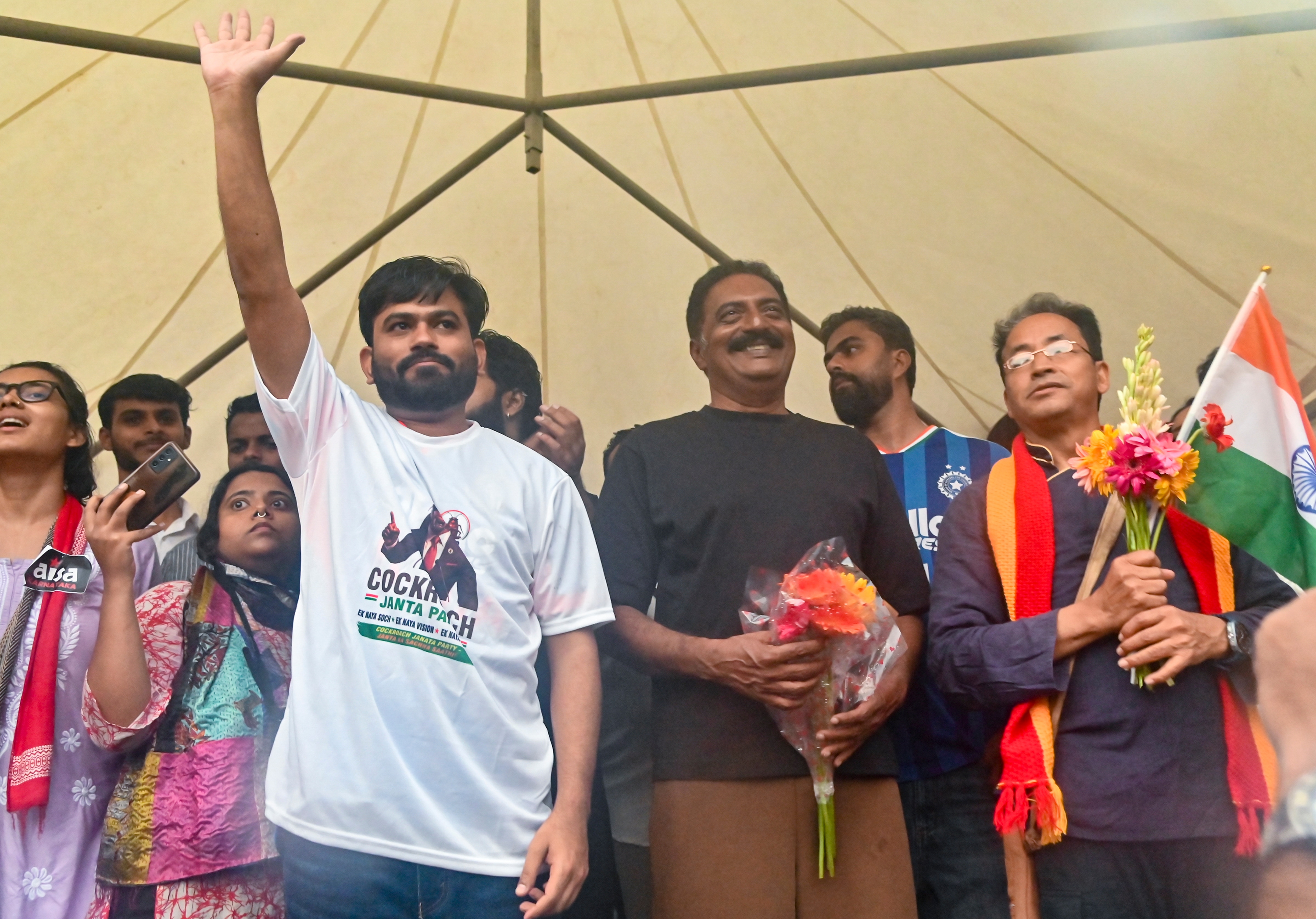 Climate activist Sonam Wangchuk, actor Prakash Raj, Cockroach Janta Party (CJP) founder Abhijit Dipke and others during a protest by CJP demanding the resignation of Union Education Minister Dharmendra Pradhan over the NEET paper leak and irregularities related to CBSE's on-screen marking system in Bengaluru. (PTI) Climate activist Sonam Wangchuk, actor Prakash Raj, Cockroach Janta Party (CJP) founder Abhijit Dipke and others during a protest by CJP demanding the resignation of Union Education Minister Dharmendra Pradhan over the NEET paper leak and irregularities related to CBSE's on-screen marking system in Bengaluru. (PTI)