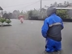 Typhoon Mekkhala, now a tropical storm, brought torrential rains to parts of southern Taiwan on Friday as warnings were issued for all three Taiwanese regions