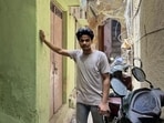Amaan appears, descending the stairs and heading to work in Gali Garaiya near Jama Masjid, where he works as a “shoker repairer.” In his early twenties, he has spent his entire life in this tiny street. (HT Photo)
