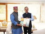 Himachal chief minister Sukhvinder Singh Sukhu with Punjab governor and Chandigarh administrator Gulab Chand Kataria in Chandigarh on Friday. (Sourced)