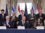 U.S. Secretary of State Marco Rubio and Israel's Ambassador to the U.S. Yechiel Leiter applaud after signing a framework agreement between Israel and Lebanon.