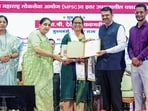 Maharashtra chief minister Devendra Fadnavis during the felicitation ceremony of the students and parents for their achievements in UPSC, MPSC and other programmes, in Pune on Friday. Fadnavis said that private coaching institutes should not treat students as a source of commercial gain, but focus on mentoring aspirants. (ANI)