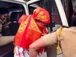 Police personnel escort accused Siya to the Lonavala Gramin Police Station for questioning in connection with the Ketan Agarwal death case.