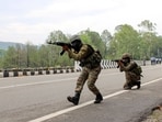 Security personnel conduct a mock drill on the Jammu-Srinagar National Highway (NH-44) in Udhampur on Thursday. (ANI)