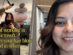 The video shows the employee getting a professional blow dry inside the office.