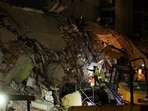 People search for casualties under the rubble of a collapsed building in the aftermath of earthquakes in Caracas, Venezuela, June 25, 2026. 