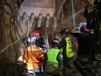 People search for casualties under the rubble of a collapsed building in the aftermath of earthquakes in Caracas, Venezuela, June 25, 2026. 