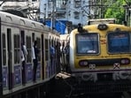 File photo: Local trains cross near section at Mumbra Railway Station(Raju Shinde/HT Photo)