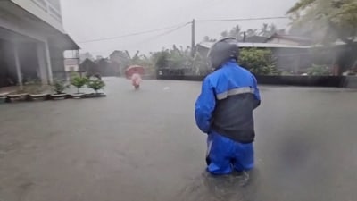 Typhoon Mekkhala, now a tropical storm, brought torrential rains to parts of southern Taiwan on Friday as warnings were issued for all three Taiwanese regions (Reuters)