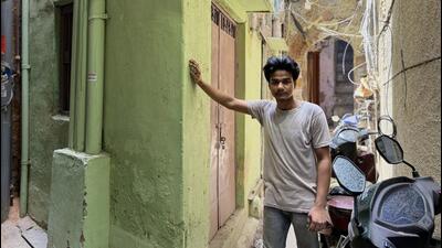 Amaan appears, descending the stairs and heading to work in Gali Garaiya near Jama Masjid, where he works as a “shoker repairer.” In his early twenties, he has spent his entire life in this tiny street. (HT Photo) Amaan appears, descending the stairs and heading to work in Gali Garaiya near Jama Masjid, where he works as a “shoker repairer.” In his early twenties, he has spent his entire life in this tiny street. (HT Photo)