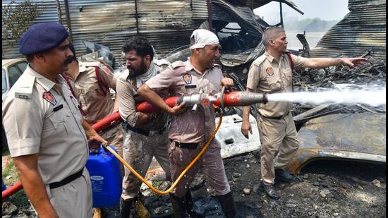 Though a short circuit is suspected, fire officials said they would investigate to ascertain what triggered the fire. (RAVI KUMAR/HT)