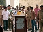 Ram Mandir donations alleged embezzlement case, following the court hearing, the eight accused are being taken away from the special court, in Ayodhya on Friday. Ram Mandir donations alleged embezzlement case, following the court hearing, the eight accused are being taken away from the special court, in Ayodhya on Friday.