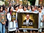 Ketan Agarwal's family members and society residents hold a candlelight march to pay tribute to him, in Pune on Saturday. (ANI Video Grab)