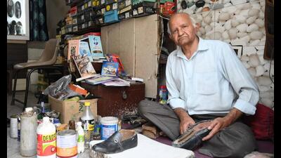 Author Dwarka Bharti in his shoe shop in Hoshiarpur. (Keshav Singh/HT) Author Dwarka Bharti in his shoe shop in Hoshiarpur. (Keshav Singh/HT)