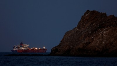 FILE PHOTO: The Callisto tanker sits anchored as the traffic is down in the Strait of Hormuz, amid the U.S.-Israeli conflict with Iran, in Muscat, Oman, March 10, 2026. REUTERS/Benoit Tessier/File Photo (REUTERS)
