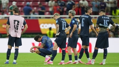 Uruguay's disappointing World Cup campaign came to a premature end, with the two-time champions becoming the highest-ranked nation to exit in the group stage after a forgettable tournament under Marcelo Bielsa. (AP Photo)