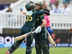 Australia's Georgia Wareham (L) and Ashleigh Gardner celebrate their win over India at the T20 World Cup. (AFP)