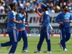 India's players celebrate the wicket of Ireland's Ross Adair during the second T20I in Belfast, Ireland, on Sunday. (Liam McBurney/PA via AP)
