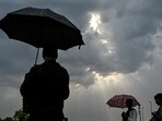 Rain clouds hover over the Kartavya Path, in New Delhi. Rain clouds hover over the Kartavya Path, in New Delhi.