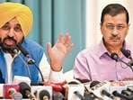 Punjab chief minister Bhagwant Mann addressing the media with AAP supremo Arvind Kejriwal in Amritsar on Sunday. (AFP)