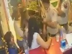 A cop slaps woman in Delhi hotel.
