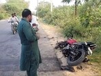 The mangled remains of the victims’ bike after it collided with a truck parked on the Faridkot-Kotkapura road. (Sanjeev Kumar/HT)