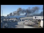 Multiple people near SFO are posting photos and videos of a significant plume of smoke and flames.