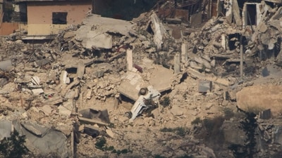 Destroyed buildings and cars in southern Lebanon are seen from northern Israel. (Photo for representation) (AP Photo) Destroyed buildings and cars in southern Lebanon are seen from northern Israel. (Photo for representation) (AP Photo)