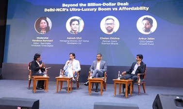 DLF Home Developers MD Aakash Ohri speaks during a discussion with panellists Chetan Chichra of Grant Thornton Bharat and Ankur Jalan of Golden Growth Fund, moderated by HT Digital's Real Estate Editor Vandana Ramnani, at the HT India Next Real Estate Summit 2026 at Bharat Mandapam in New Delhi on June 27. (HT Photo )