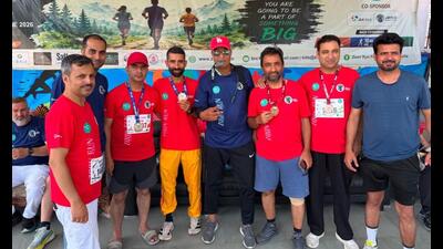 Participants showing their medals after the marathon in Baramulla on Sunday. (HT Photo) Participants showing their medals after the marathon in Baramulla on Sunday. (HT Photo)
