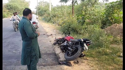 The mangled remains of the victims’ bike after it collided with a truck parked on the Faridkot-Kotkapura road. (Sanjeev Kumar/HT) The mangled remains of the victims’ bike after it collided with a truck parked on the Faridkot-Kotkapura road. (Sanjeev Kumar/HT)