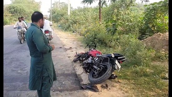The mangled remains of the victims’ bike after it collided with a truck parked on the Faridkot-Kotkapura road. (Sanjeev Kumar/HT)