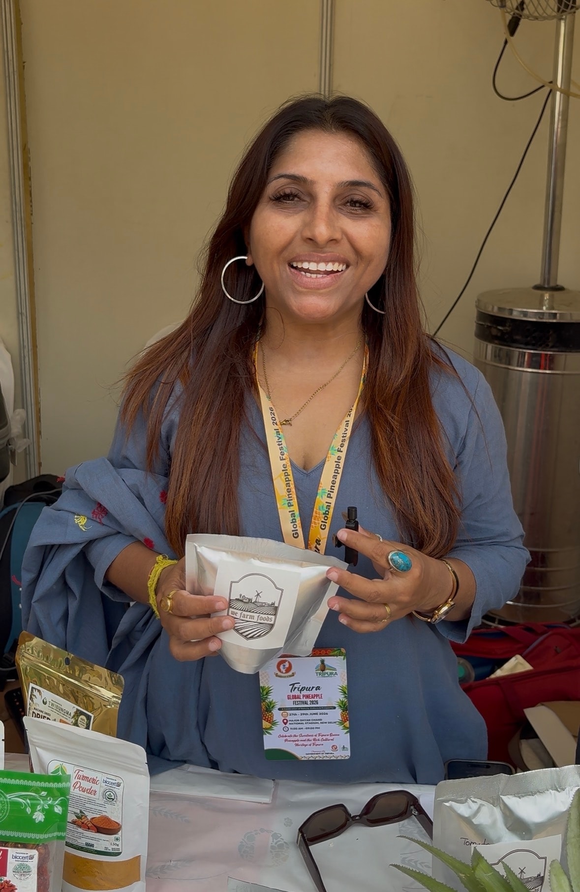 Pinky Dutta, a stall vendor, shows how her team is using zero-waste technology to produce pineapple-based products. (Photo: Anshita Jain/HT) Pinky Dutta, a stall vendor, shows how her team is using zero-waste technology to produce pineapple-based products. (Photo: Anshita Jain/HT)