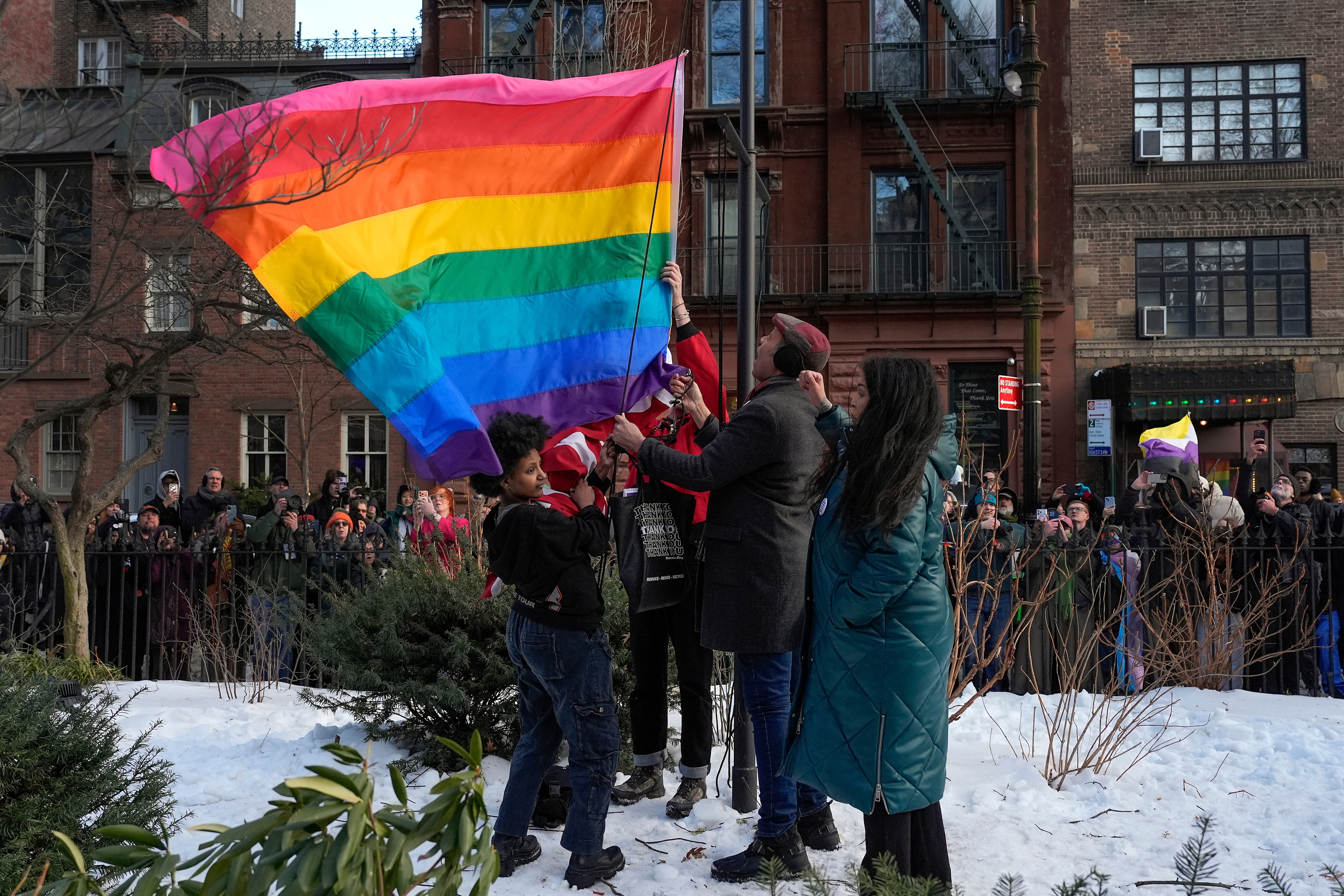 New York politicians and activists raise a rainbow flag on a pole in Christopher Park across the street from the Stonewall Inn, Thursday, Feb. 12, 2026, in New York, a few days after it was removed by the National Park Service to comply with guidance from the Trump administration. (AP) New York politicians and activists raise a rainbow flag on a pole in Christopher Park across the street from the Stonewall Inn, Thursday, Feb. 12, 2026, in New York, a few days after it was removed by the National Park Service to comply with guidance from the Trump administration. (AP)