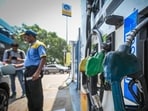 A petrol pump attendant fills fuel in a vehicle at a petrol station in New Delhi (Hindustan Time File/Sanchit Khanna)