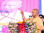 Uttar Pradesh Chief Minister Yogi Adityanath speaks during the inauguration and foundation stone laying program of 143 development projects, in Hathras on Sunday.(X/@CMOfficeUP)