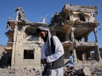 Residents walk through the rubble after what Taliban officials said were Pakistani airstrikes a day earlier that killed civilians, including children, in the village of Mandokhail, Chamkani district, Paktia province, Afghanistan, on Monday, June 29, 2026.