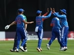India's players celebrate the wicket of Ireland's Ross Adair.