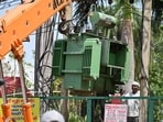 Officials from both power utilities agree electricity is available, but disagree on whether overloaded substations or weak distribution planning are to blame. (Parveen Kumar/HT)