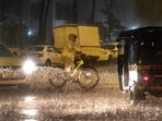 Commuters ply on a road amid rain, in Mumbai, early Monday, June 29, 2026. Commuters ply on a road amid rain, in Mumbai, early Monday, June 29, 2026.