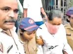 Pune, Jun 28 (ANI): Police take Ketan Agarwal murder case accused Siya Goyal from Lohagad Fort to Lonavala Police Station after crime scene recreation was done, in Pune on Sunday. (ANI Video Grab) (ANI Video Grab)