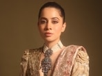 Uorfi Javed called out a content creator for claiming she wears 'adhe nange' clothes. 