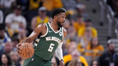 Former NBA athletes Malik Beasley and Ed Davis, along with others, were indicted for a sports betting scheme. (AP Photo/Michael Conroy, file) (AP Photo/Michael Conroy) Former NBA athletes Malik Beasley and Ed Davis, along with others, were indicted for a sports betting scheme. (AP Photo/Michael Conroy, file) (AP Photo/Michael Conroy)