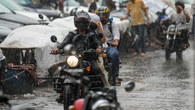 Gram it: Motorists make way through a rain-soaked road on Okhla-Sarita Vihar route as Delhi finally saw showers. But just before this downpour, on Monday afternoon the Capital its highest-ever peak power demand, witnessing a new all-time record, at 8,748 MW amid the heatwave. (Photo: Salman Ali / PTI)