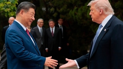 US President Donald Trump with Chinese President Xi Jinping at the Zhongnanhai Garden in Beijing on May 15. (AP) US President Donald Trump with Chinese President Xi Jinping at the Zhongnanhai Garden in Beijing on May 15. (AP)