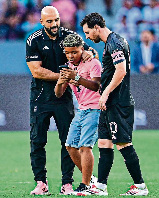 Lionel Messi's bodyguard Yassine Cheuko is a former US Navy SEAL. Lionel Messi's bodyguard Yassine Cheuko is a former US Navy SEAL.