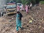 A truck stuck in debris after rain-triggered mudslide in Shimla on Tuesday. (Deepak Sansta/HT)
