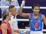 Birmingham: India's Lovlina Borgohain (Blue) after her win against Ariane Nicholson (Red) of New Zealand during the women's 66-70kg (light middleweight) boxing match of the Commonwealth Games 2022 (CWG), in Birmingham, UK, Saturday, July 30, 2022. Borgohain won the match 5-0 (PTI Photo/Swapan Mahapatra)(PTI07_31_2022_000017B) (PTI)